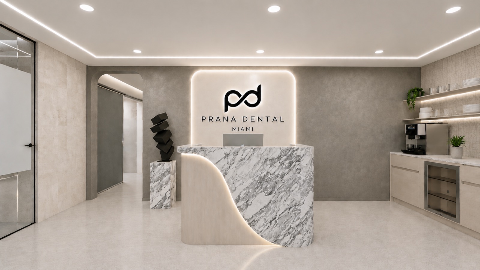 Prana Dental Miami reception with hand-laid marble desk and backlit logo