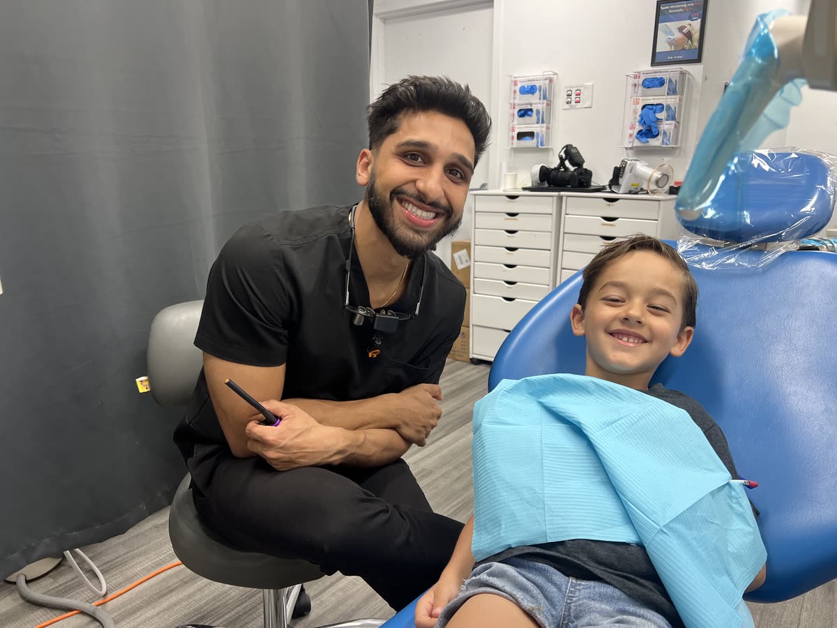 Dr. Rana with a young patient